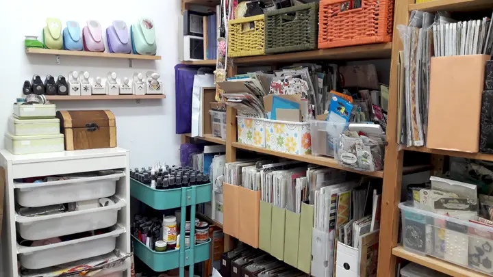 organized craft supplies on shelves and in boxes